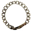 Wide metal chain belt Guy Laroche 70-75 cm