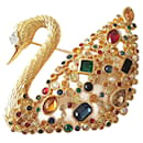 1995 - Iconic brooch adorned with Swarovski crystals