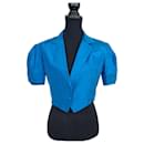 Jaqueta curta YSL em seda azul. - Yves Saint Laurent