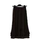 Falda de seda negra Chanel Jupe de los años 90 FR34/36 US4/6