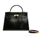 1965 Hermes Sac Kelly 32 kostbare schwarze Lederhandtasche und Riemen - Hermès