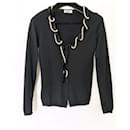 Moschino Cheap and Chic black cardigan adorned with a white pearl necklace - Moschino Cheap And Chic