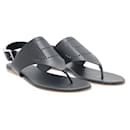 Hermes en cuir noir Kola Thong Flat Slingback Sandals - Hermès