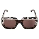 Eckige Sonnenbrille mit Zierausschnitten - Gucci