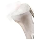 Zapatillas Slip-On con adornos de Miu Miu en cuero blanco