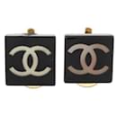 CHANEL CLIP LOGO C EARRINGS IN BLACK RESIN & GOLD METAL EARRINGS - Chanel