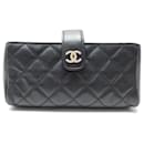 CHANEL O-MINI WALLET IN QUILTED LEATHER WALLET - Chanel