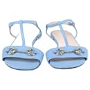 Sandales plates à bride en T bleu clair Gucci