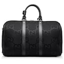 Gucci Kleine Jumbo-Reisetasche aus GG-Canvas in Schwarz