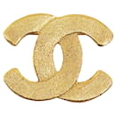 Goldene Chanel CC-Brosche