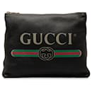 Bolsa clutch preta de couro com logotipo Gucci Gucci