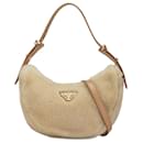 Borsa Prada Arqué in shearling marrone e pelle