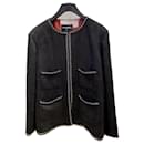 Most Hunted Black Jacket with Chain Trim - Chanel