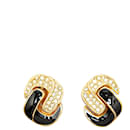 Boucles d'oreilles clip en strass et cristal avec nœud en émail doré Dior