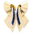 Broche vintage "Ruban" double clips or rose, pierres bleues. - inconnue