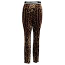 Dolce & Gabbana Pantalones con estampado de leopardo de seda y cinturilla con logo - Autre Marque
