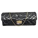 CHANEL EAST WEST BAGUETTE HANDBAG MADEMOISELLE CLASP IN LEATHER HAND BAG - Chanel