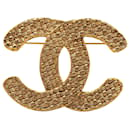 Broche plaquée or Chanel Gold CC