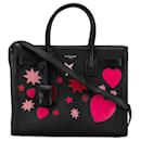 Bolso satchel Sac De Jour negro con diseño de corazón y patchwork de bebé de Saint Laurent