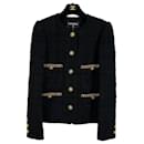 Nueva chaqueta icónica de tweed negro - Chanel