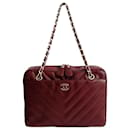 Borsa a tracolla Chanel Camera Chevron Quilted in pelle bordeaux