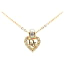 Collar con colgante de diamantes de imitación con logo dorado de Dior