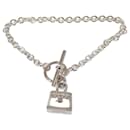 Bracciale Hermes in argento con amuleto Kelly e catena in metallo in buone condizioni - Hermès