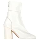 Chanel CC Low Heel Ankle Boots in White Leather