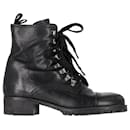 Prada Lace-Up Combat Boots in Black Leather