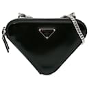 Pochette triangulaire en cuir noir Mini Spazzolato Prada