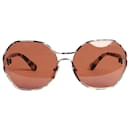 Óculos de sol redondos em formato de tartaruga marrom - Prada