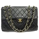 BOLSO DE MANO VINTAGE CHANEL SQUARE TIMELESS BOLSO DE MANO DE PIEL ACOLCHADA - Chanel