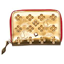 Portafoglio in vernice borchiata Christian Louboutin oro e rosso