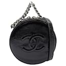Bolso satchel redondo de charol Chanel negro como tierra