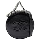 Sac à main rond en cuir verni Chanel noir comme Earth