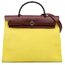 Bolso satchel Hermès Toile Herbag con cremallera 31 amarillo