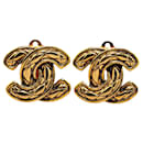 Boucles d'oreilles à clip matelassées CC Chanel dorées