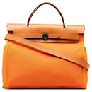 Orangefarbene Hermès Toile Herbag Zip 31 Umhängetasche