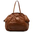 Braune Prada-Tasche aus Nappaleder mit Schleife im Antik-Look