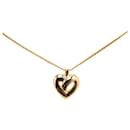 Conjunto de pendientes y collar con corazones chapados en oro Dior Gold