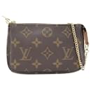 Brown Louis Vuitton Monogram Mini Pochette Accessoires Handbag