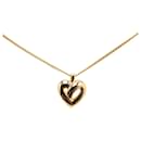 Conjunto de collar y pendientes de corazones bañados en oro Dior dorados