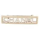 NUEVO BROCHE CHANEL STRASS LOGO METAL ORO 2023 BROCHE NUEVO ACERO DORADO - Chanel