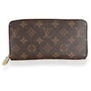 Portefeuille zippé en toile Monogram Louis Vuitton