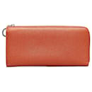 Bvlgari Orange Calf Leather Round Zipper Long Wallet in Very Good Condition - Bulgari