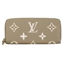 Cartera larga Clemence Monogram Empreinte Bicolor Louis Vuitton M82478 en excelente estado