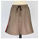 Pantalón corto de punto con tribanda y estampado Gg marrón de Gucci