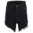 Balenciaga Frayed Cut-Up Mini Skirt in Black Denim