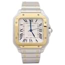 Cartier “Santos” gold watch, steel.