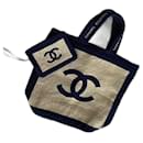 Chanel beach bag and towel